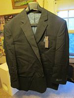 Front view of dark charcoal GS Perfect Fit sport coat on hanger