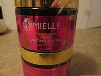 Front view of stacked jars showing Twisting Soufflé label