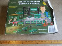 Back of box displaying assembled playset and contents