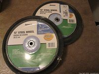 Pair of Arnold 12" steel wheels in packaging