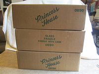 Three sealed Princess House 0890 cartons stacked