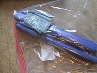 Two purple Starbucks reusable straws in sealed bag with tag