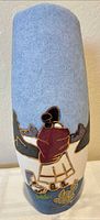Full view of vase front showing Indigenous figure and desert scene
