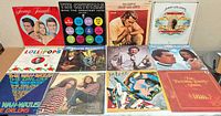 Overall shot of 12 LP covers laid out 4×3
