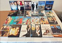 Overall view of all 24 DVD sets laid out in four rows