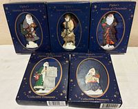 Front view of all five boxed ornaments