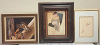 Three framed artworks side by side