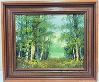 Full view of framed oil painting showing forest scene and frame