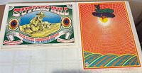 Both posters side by side showing full artwork and scale