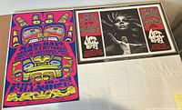 Both posters side by side showing overall condition and size