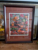 Full view of framed artwork