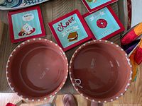 Bowls and four square plates visible