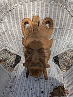 Front view of carved wooden tribal mask