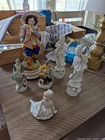 Group shot of all six figurines on table