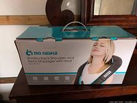 Retail box front showing brand, model and product image