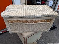 Front and top view of wicker storage chest
