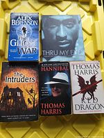 Front covers of all five paperback books