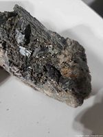 Oblique view showing epidote crystal faces and matrix