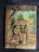 Front view of carved and painted Romanian wood plaque showing complete scene
