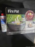 Boxed GreenEarth Fire Pot showing product image and branding