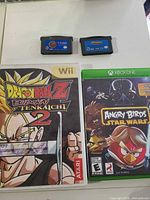 Group shot of Wii, Xbox One cases and two GBA cartridges