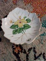Front view of Berkshire Fine China leaf dish showing floral decoration and gold trim