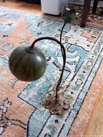 Full view of lamp showing shade, stem and base