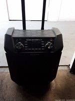 Front view of ION Block Rocker Plus speaker showing control panel and telescoping handle