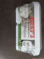 Sealed package showing Jerry's Brush Washer and Basin label and illustration