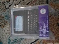 Front view of sealed electronic dictionary in packaging