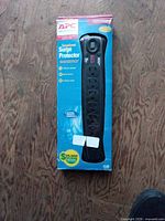 Front of sealed APC SurgeArrest surge protector box