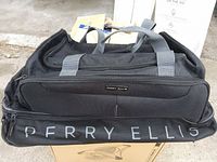 Front view showing Perry Ellis logo and overall bag structure