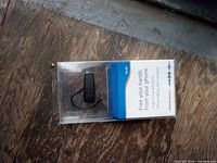 Front view of boxed Plantronics Bluetooth headset
