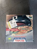 Box top of Rival single burner showing product image and shipping label