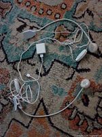 Both LED lights with cords, clips and USB adapters visible
