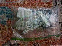 Sealed Sansi LED clip light in plastic bag