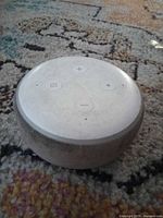 Top view of Amazon Echo Dot showing control buttons
