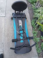 Total Gym XLS folded showing glideboard, headrest, cables and handles