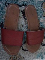 Top view of both slide sandals showing strap and footbed