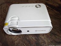 Top angled view showing lens, focus and keystone controls, control buttons and Vankyo branding