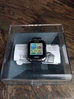 Front view of VTech Kidizoom Smartwatch DX2 in sealed clear retail box