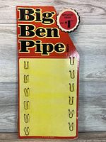 Front view of Big Ben Pipe cardboard display showing graphics and hooks