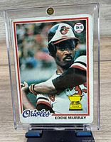 Front of Eddie Murray 1978 Topps rookie card in screw-down case