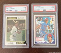 Both PSA-graded cards front view in slabs