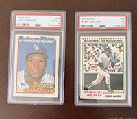 Front view of both PSA slabbed cards