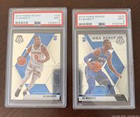 Both graded RJ Barrett Mosaic rookie cards in PSA slabs