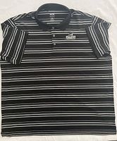 Front view of striped Providence College adidas polo shirt