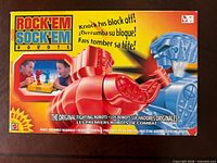 Front view of sealed Rock’em Sock’em Robots game box showing full artwork and title