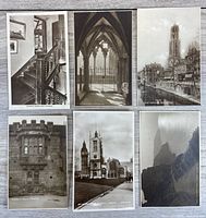 Overview of six real photo postcards laid out on tabletop