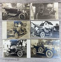 Six postcards laid out for overview